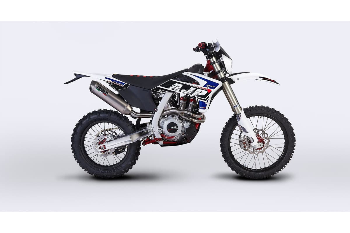 2025 AJP SPR310R enduro bike in white, blue and black, right-side studio profile on a white background