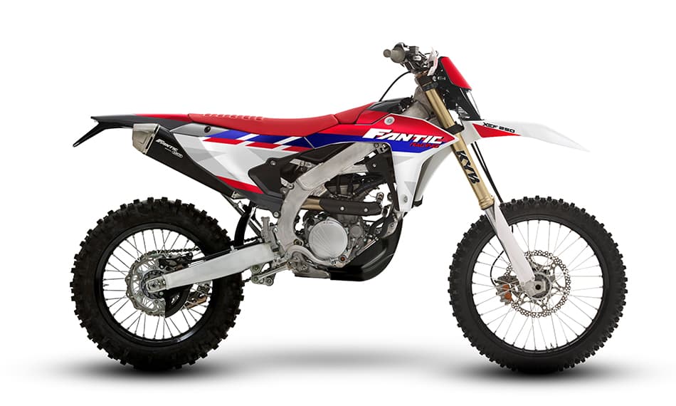 2025 Fantic XEF 250 TL enduro in red, white and blue, right-side studio profile showing gold KYB forks, spoked wheels and knobby tires