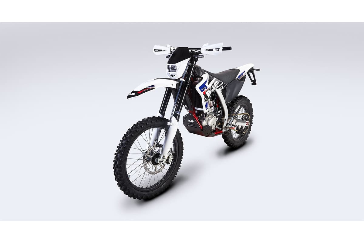 AJP SPR250 front three-quarter studio view showing the headlight cowl, Sachs 48mm fork and Brembo front disc
