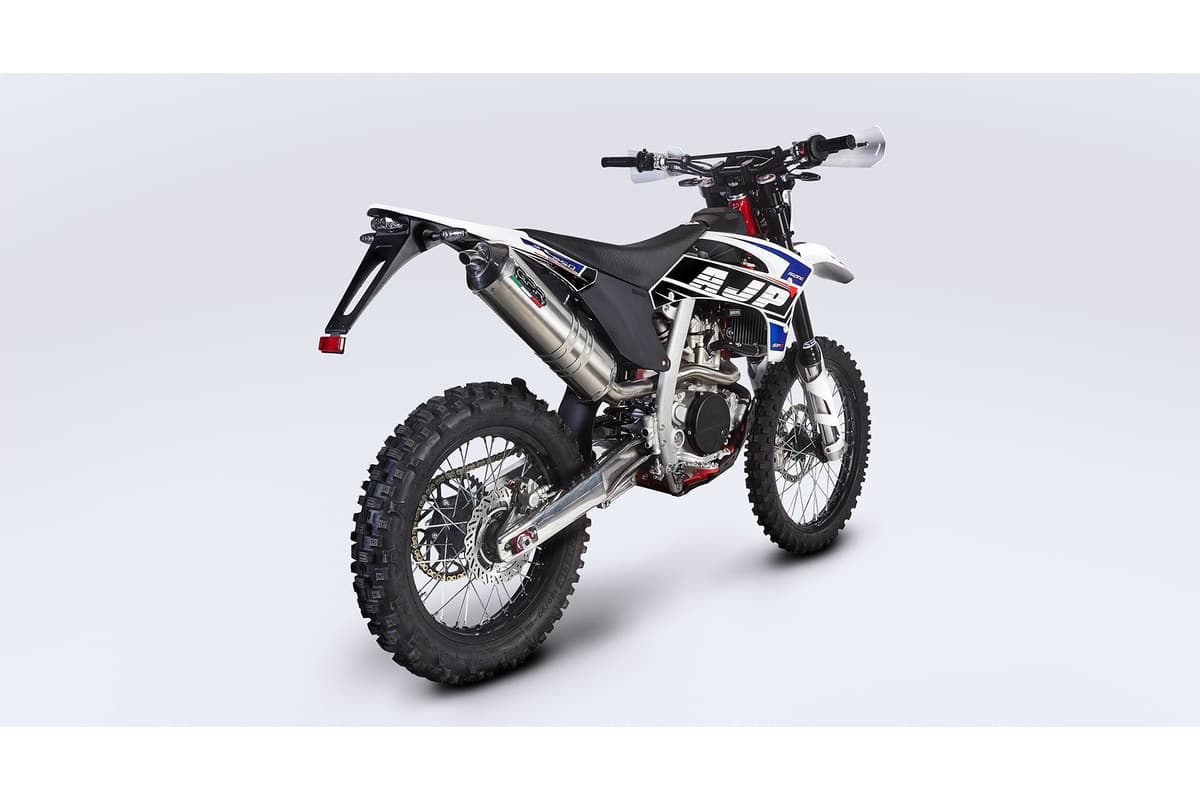 AJP SPR250 rear three-quarter studio view showing the muffler, rear fender and 18-inch rear wheel