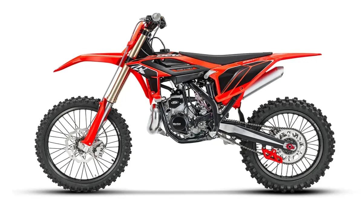 Beta 250 RX left-side studio profile highlighting the two-stroke engine cases, red frame guards and red rear hub