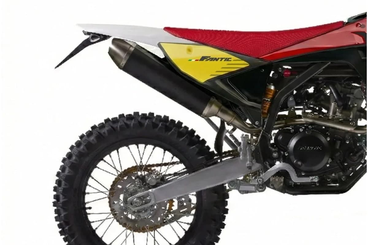 Rear-half detail of the Fantic TL250 Caballero showing the aluminium swingarm, rear wave disc and Arrow muffler