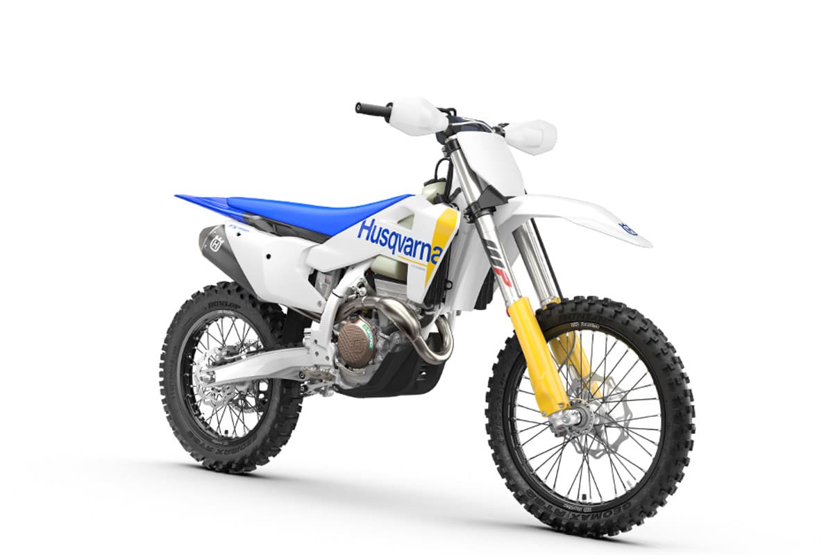 Husqvarna FX 350 in white with blue graphics, front three-quarter studio view showing the WP fork, disc brake and slim radiator shrouds