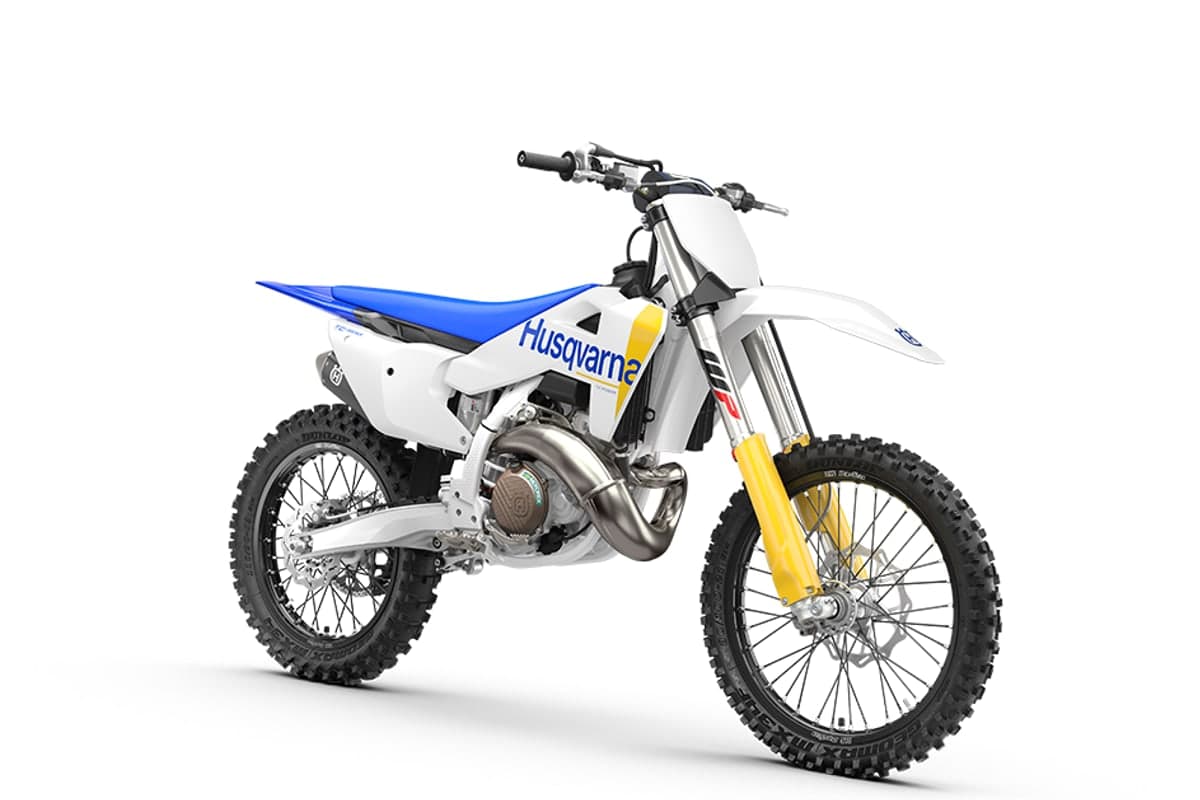 Husqvarna TC 300 right-front studio view showing the front number plate, fork guards and front disc