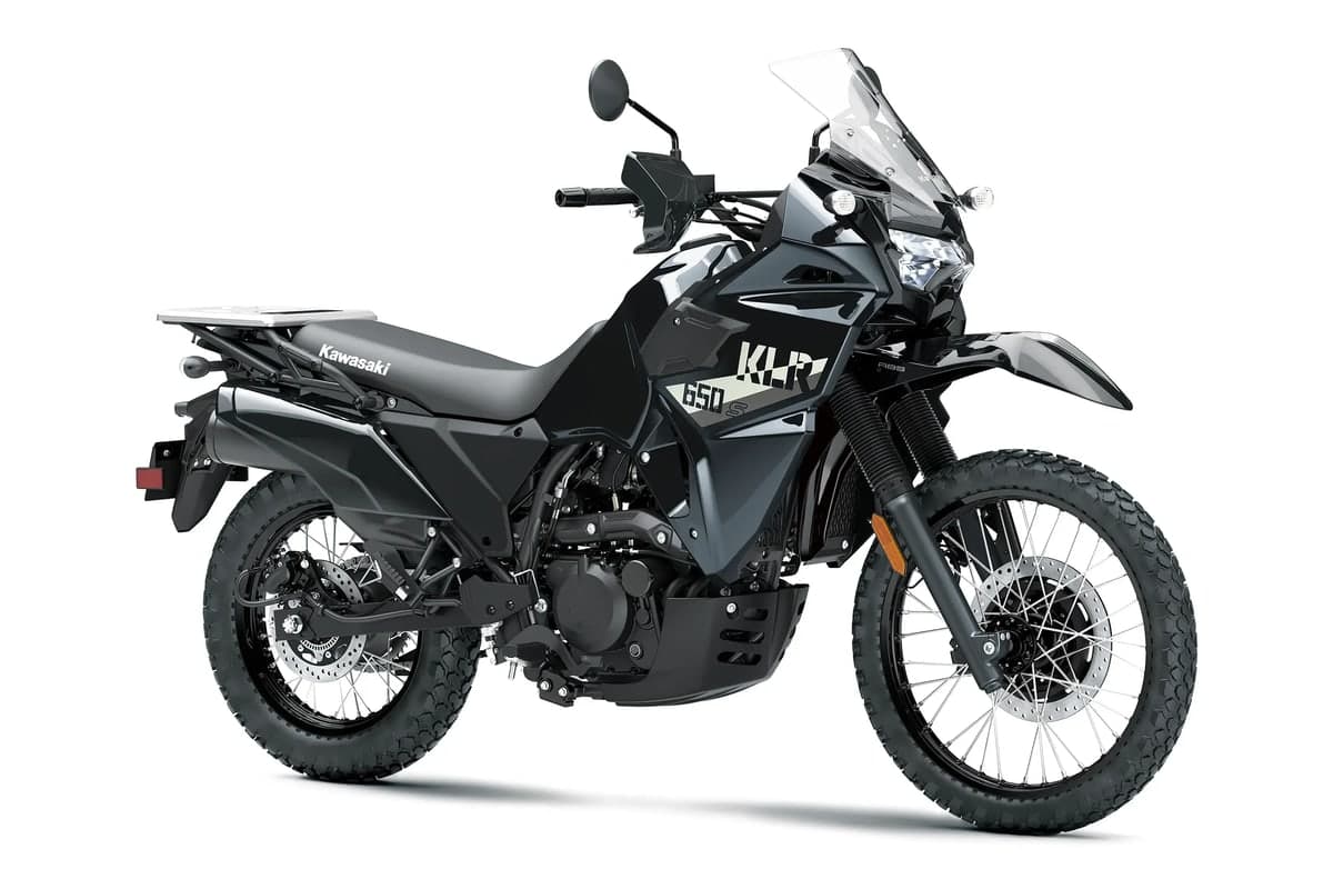 Kawasaki KLR650 S front three-quarter studio view showing the windscreen, hand guards and headlight