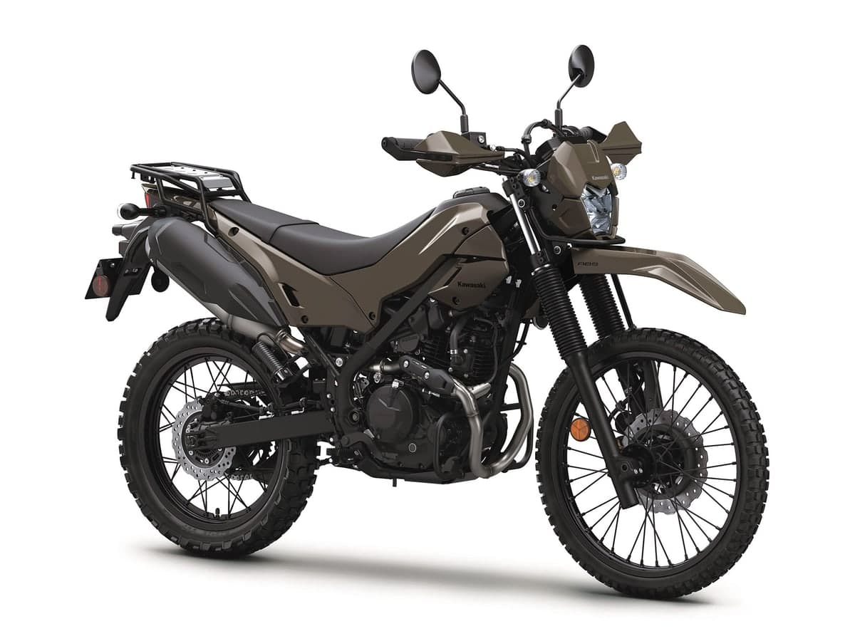 Kawasaki KLX230 DF ABS in bronze and black, front three-quarter studio view highlighting the round LED headlight, handguards and long-travel forks