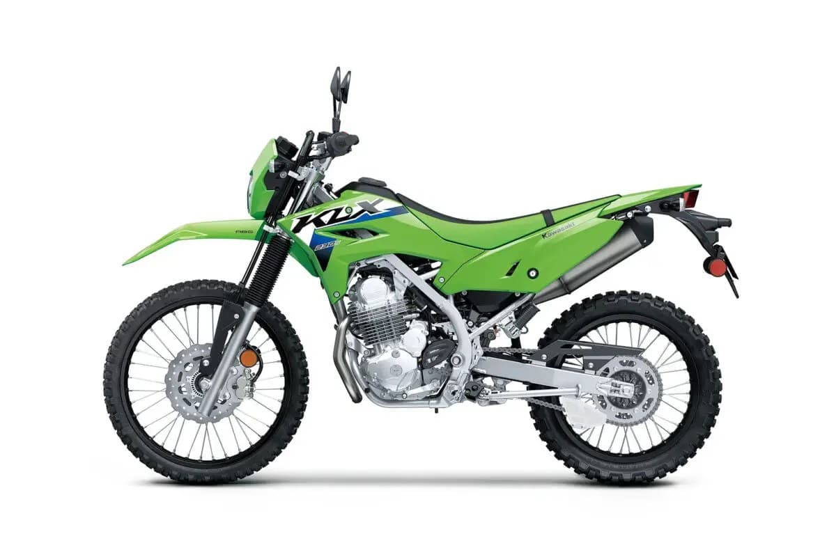 Kawasaki KLX230 S ABS left-side studio profile in lime green showing the exhaust muffler, engine cases and chain-driven rear wheel