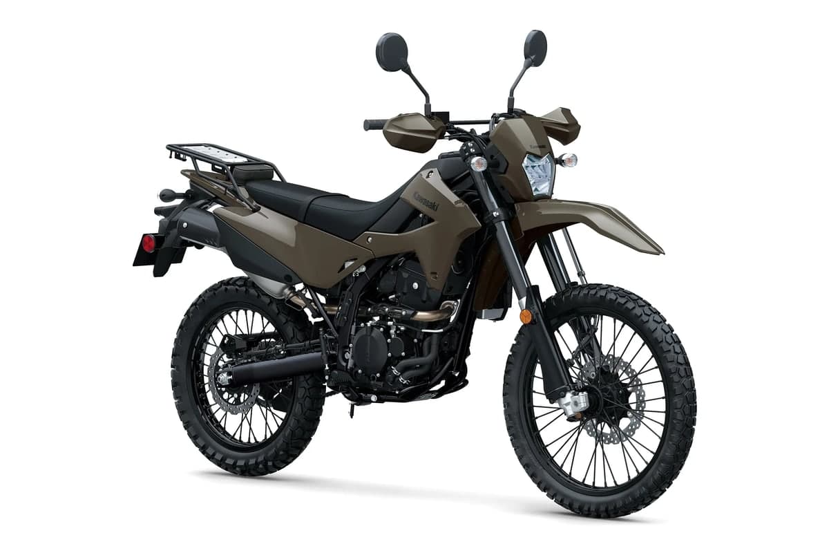 Kawasaki KLX300 DF ABS front three-quarter studio view showing the hand guards, LED headlight and rear carrier