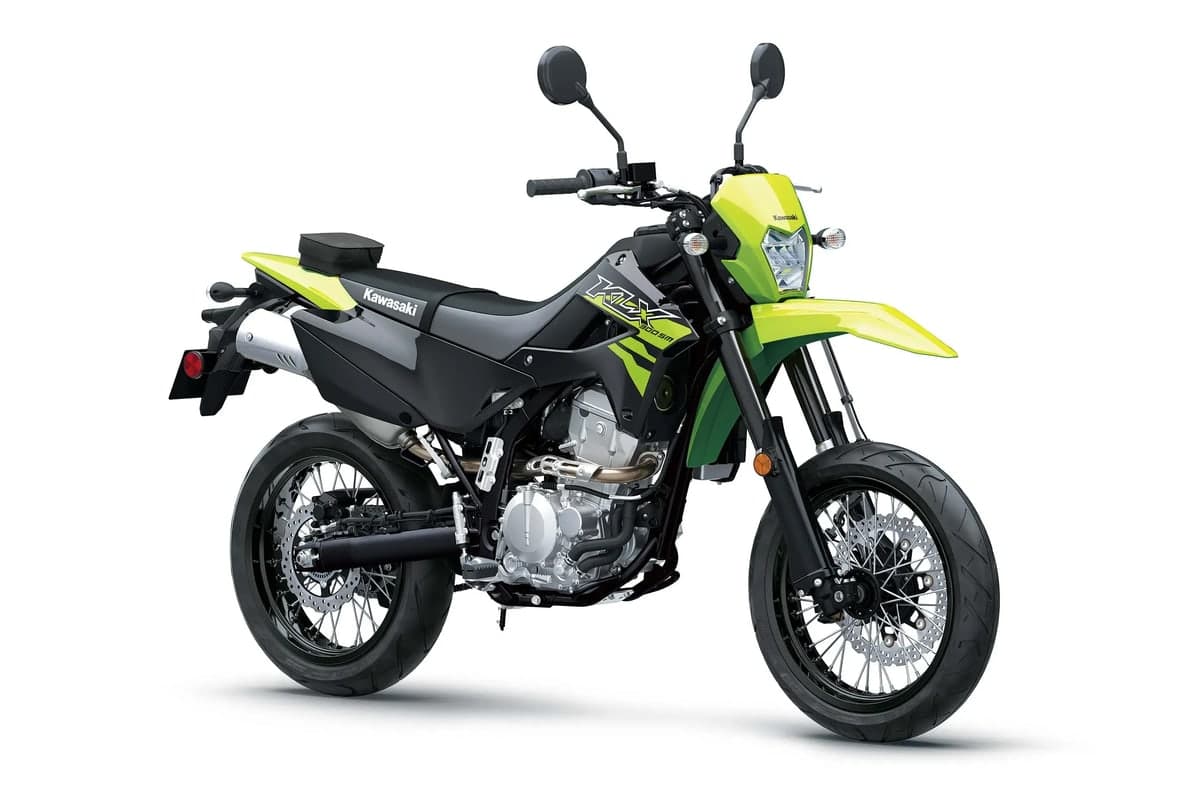 Kawasaki KLX300SM ABS front three-quarter studio view showing the LED headlight and front disc