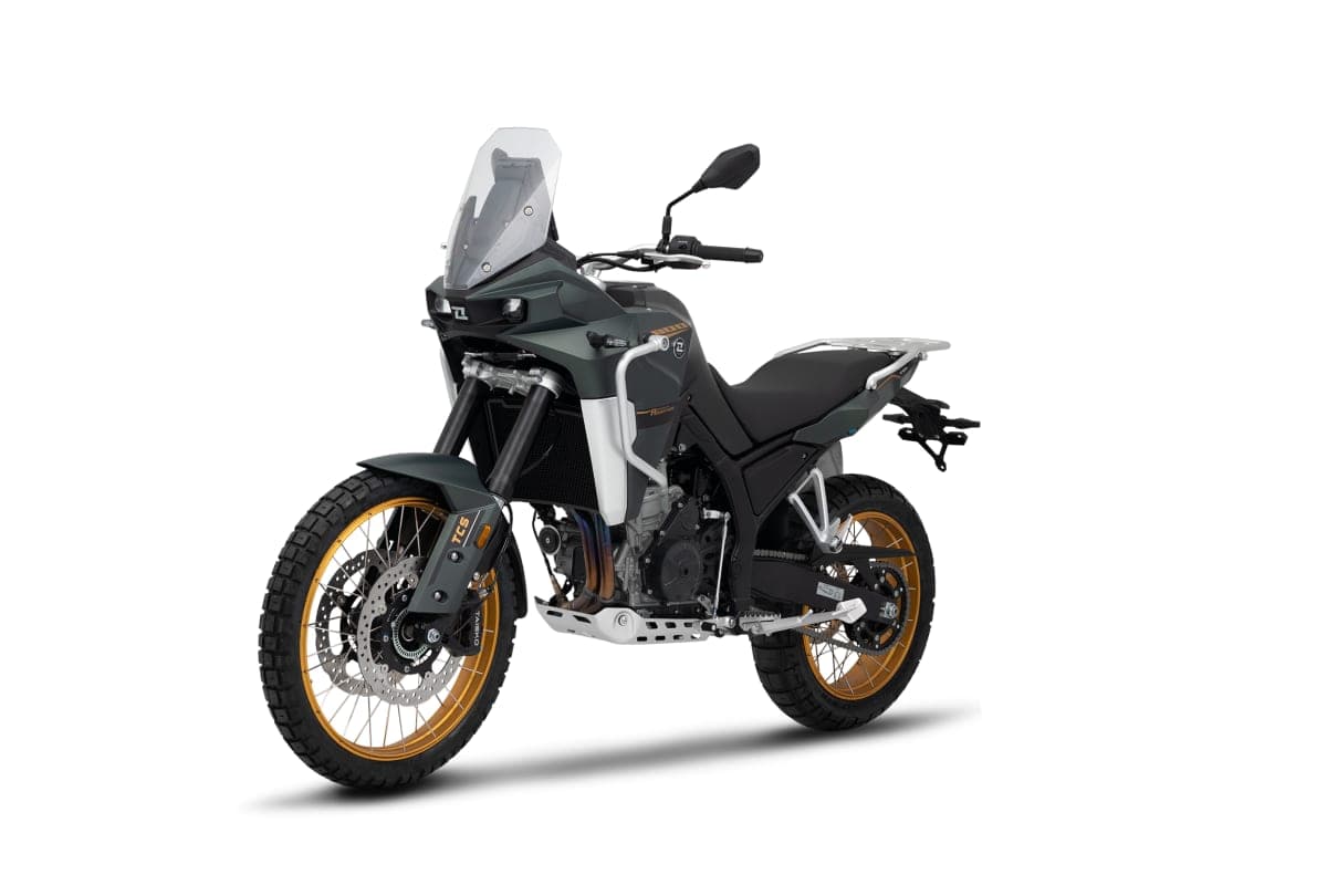 Kove 800X Pro front three-quarter studio view highlighting the beak headlight, upside-down forks, radiator shrouds and gold rim striping