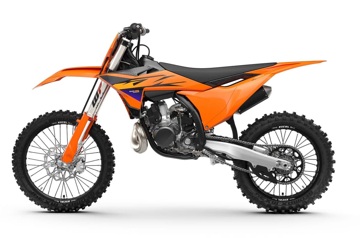 KTM 250 SX left-side studio profile highlighting the WP fork, orange bodywork graphics and exposed two-stroke engine cases