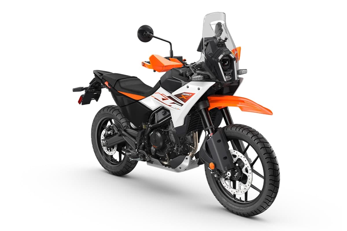 KTM 390 Adventure X in white, right-front studio view showing the headlight mask, screen and front disc