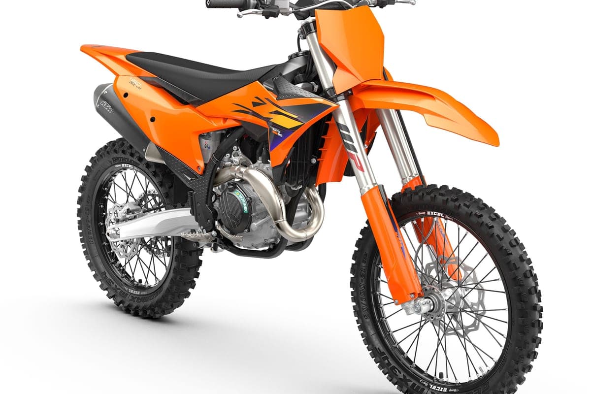 KTM 450 SX-F front three-quarter studio view highlighting the WP inverted fork, front disc brake and angular orange front fender