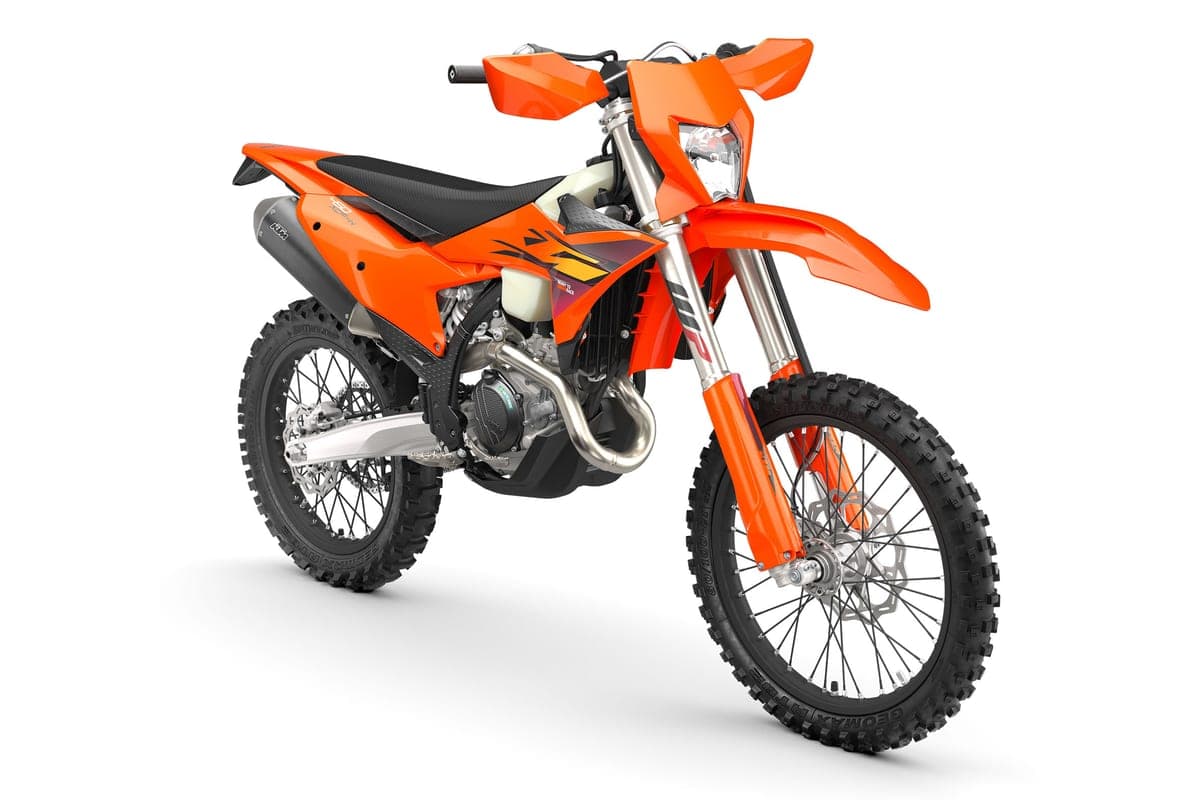 2027 KTM 450 XCF-W front three-quarter studio view showing the WP inverted forks, headlight and radiator shrouds