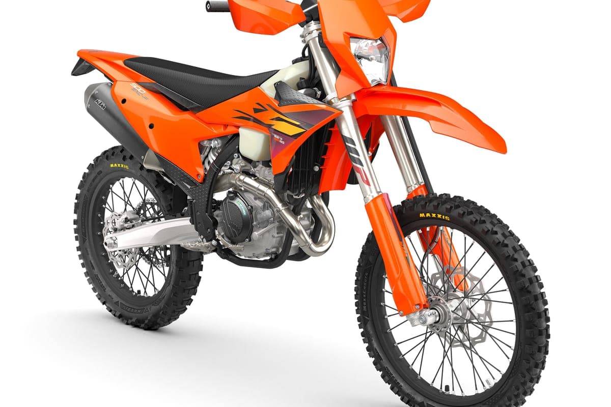 KTM 500 EXC-F front three-quarter studio view showing the WP inverted fork, translucent fuel tank and headlight