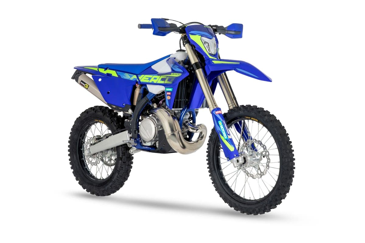 2027 Sherco 250 SE Factory, front three-quarter studio view highlighting the WP inverted fork, LED headlight and white airbox shrouds