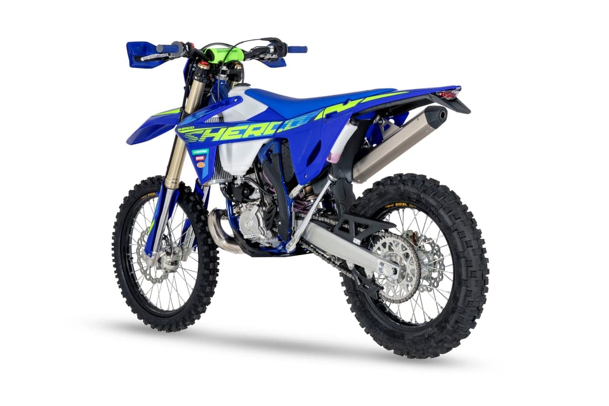 Sherco 250 SE Factory left-side rear three-quarter view with forks turned, showing the rear sprocket, linkage shock and skid plate