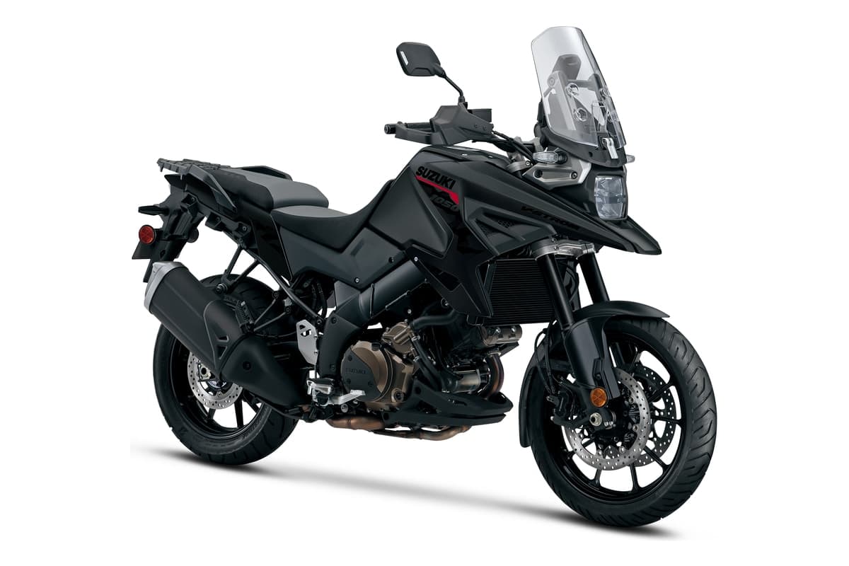 2027 Suzuki V-Strom 1050 in matte black, front three-quarter studio view showing the LED headlight, radiator shroud and front brake discs