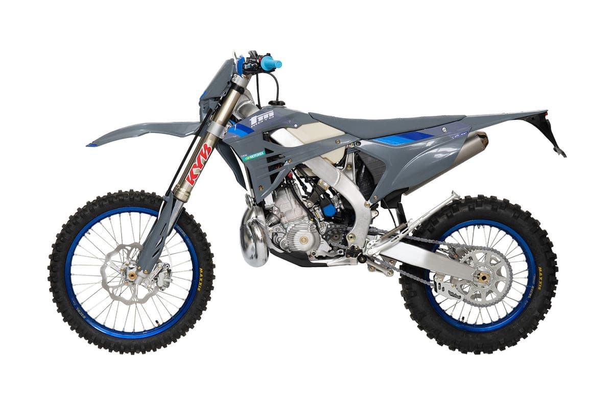 TM EN 300 FI 2T side-on studio profile showing the two-stroke engine, KYB fork lowers and slim grey bodywork with blue graphics