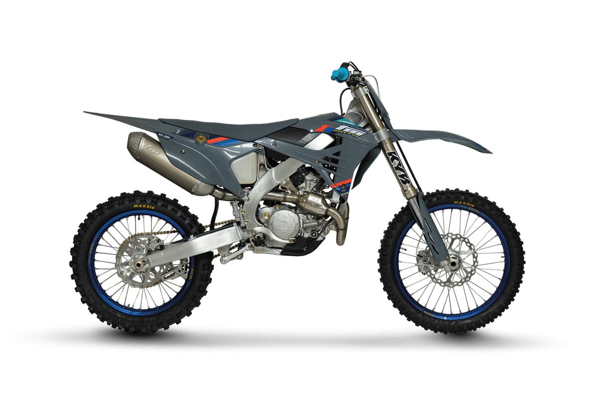 TM MX 250 ES Fi 4T studio view from the opposite side, showing the exhaust, TM Moto shock and aluminium swingarm