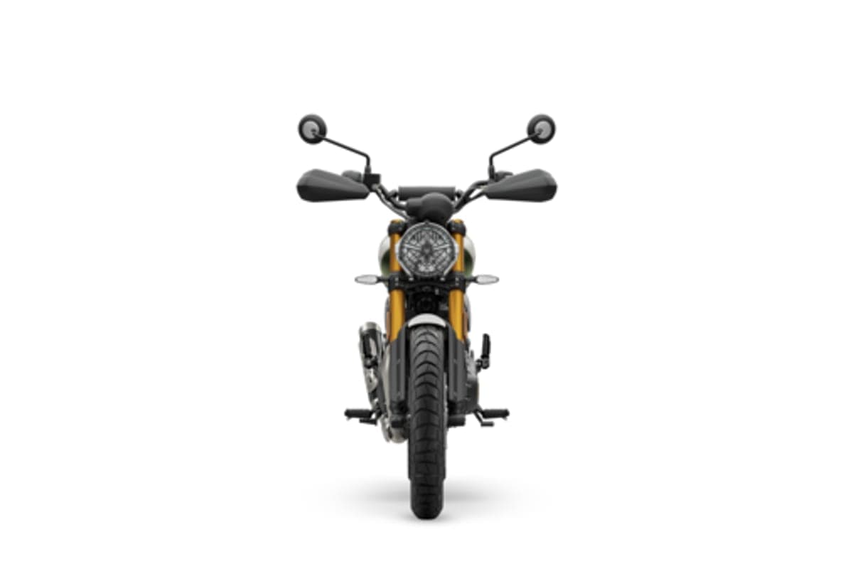 Triumph Scrambler 400 X studio front view showing the round LED headlight, handguards, gold front forks and knobby front tire