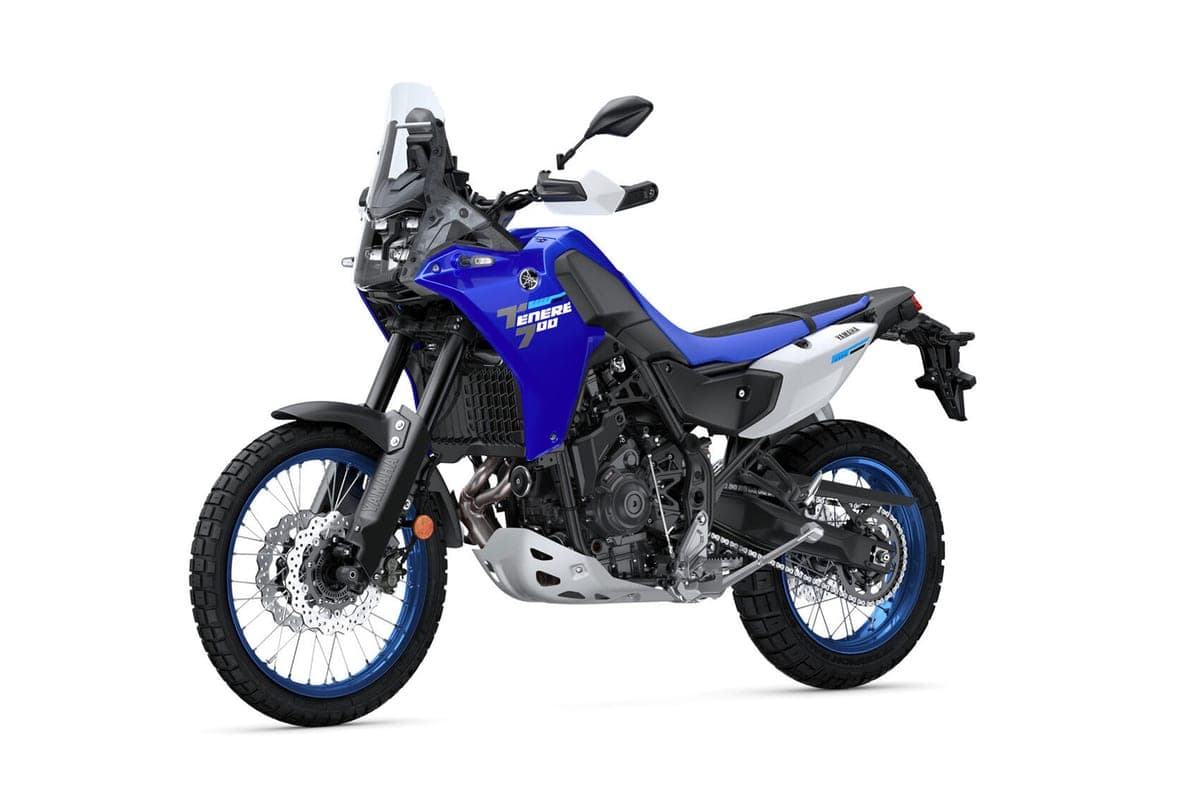 Ténéré 700 front three-quarter studio view highlighting the tall windscreen, engine guard, twin-cylinder motor and long-travel forks