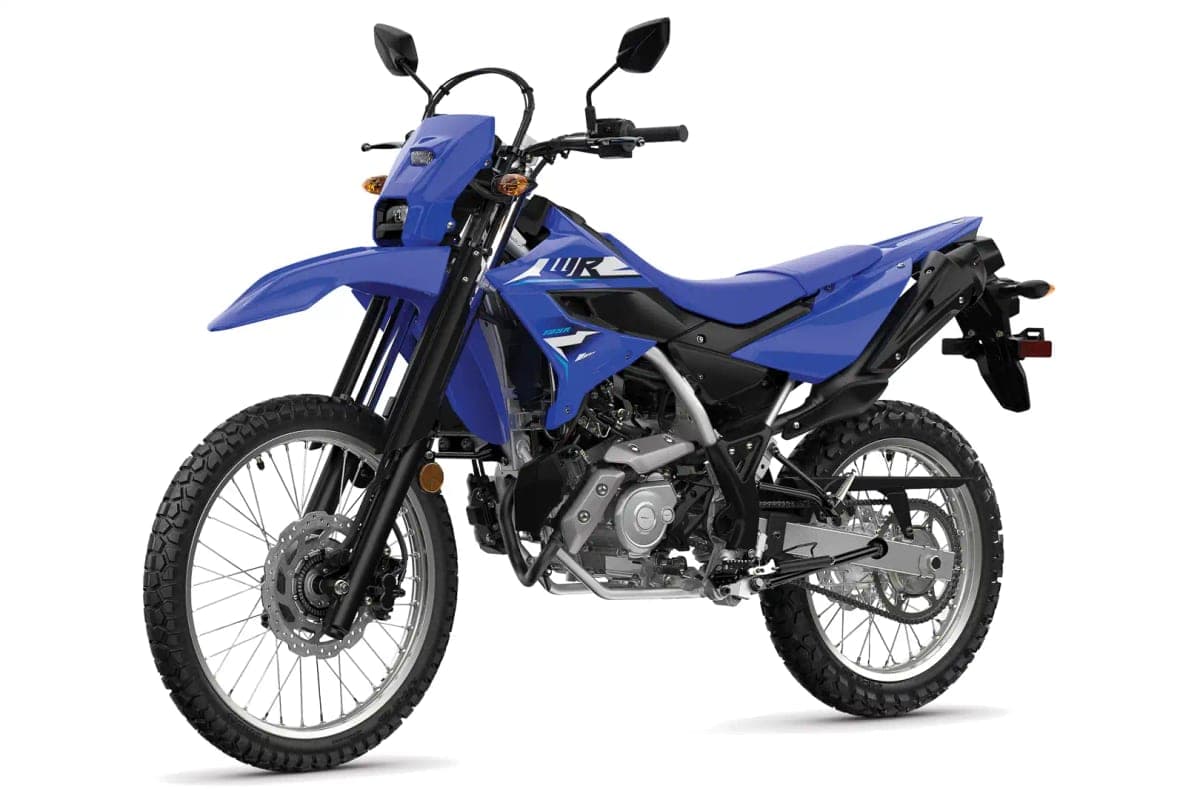 Yamaha WR125R front three-quarter studio view highlighting the LED headlight, inverted fork and blue bodywork with white WR graphics