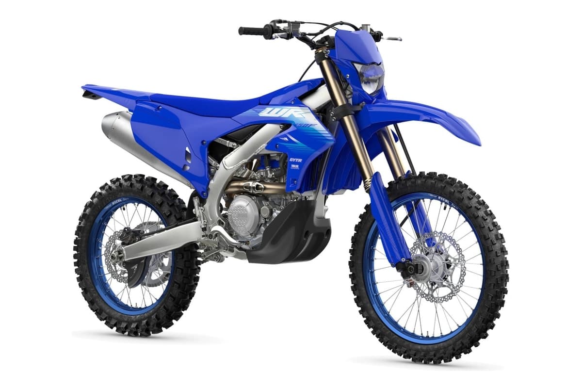 2027 Yamaha WR450F front three-quarter studio view showing the headlight number plate, KYB fork and the right side of the new frame
