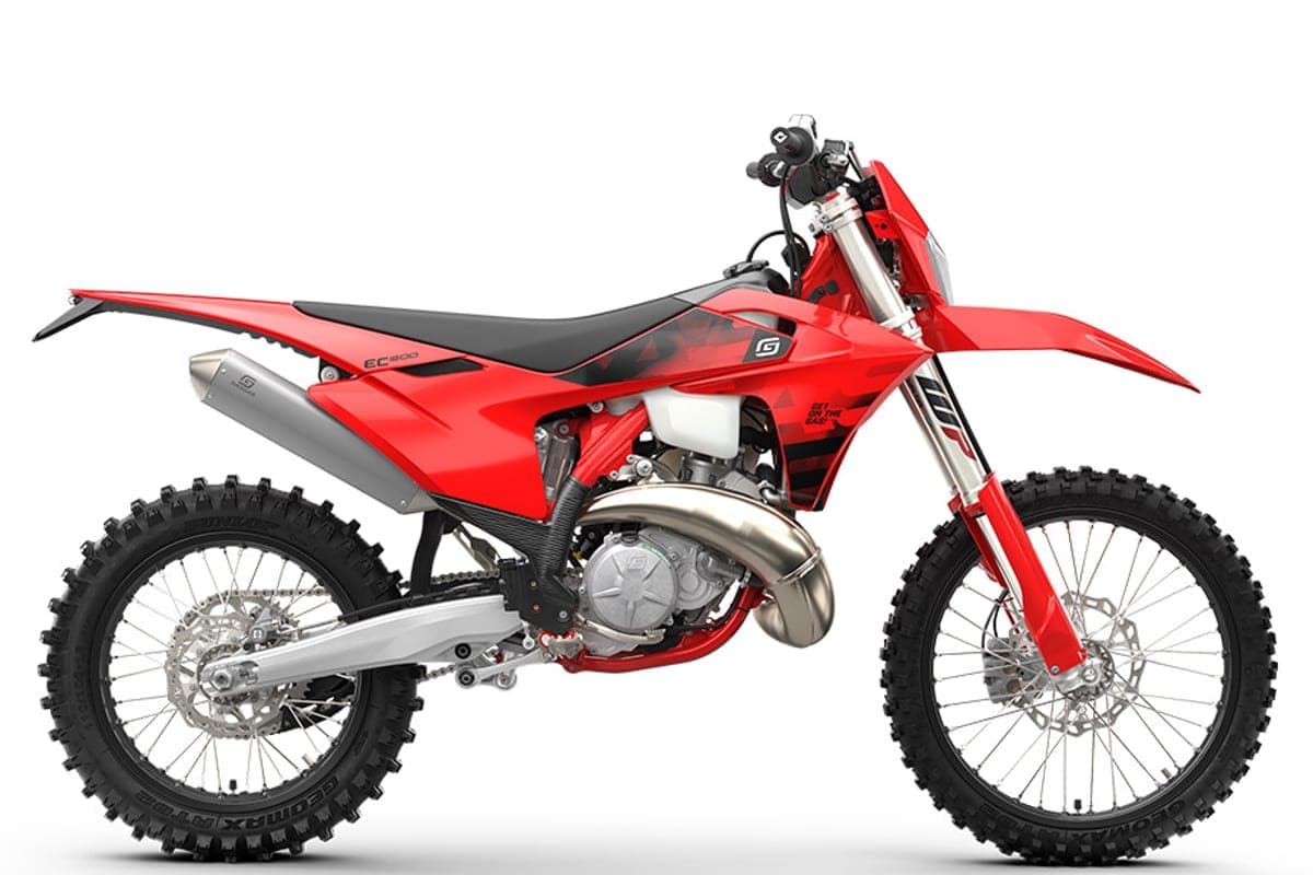 2027 GasGas EC 300 two-stroke enduro in red with black seat graphics, right-side studio profile showing the WP fork and expansion chamber exhaust