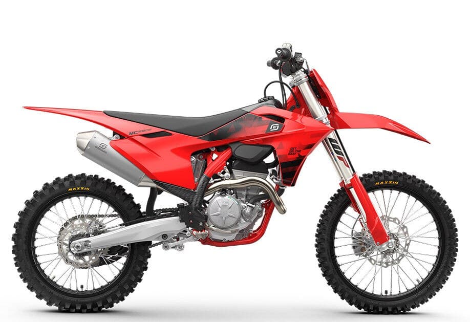 2027 GasGas MC 250F motocross bike in red and black, right-side studio profile showing the WP forks, silver muffler and Maxxis knobby tires
