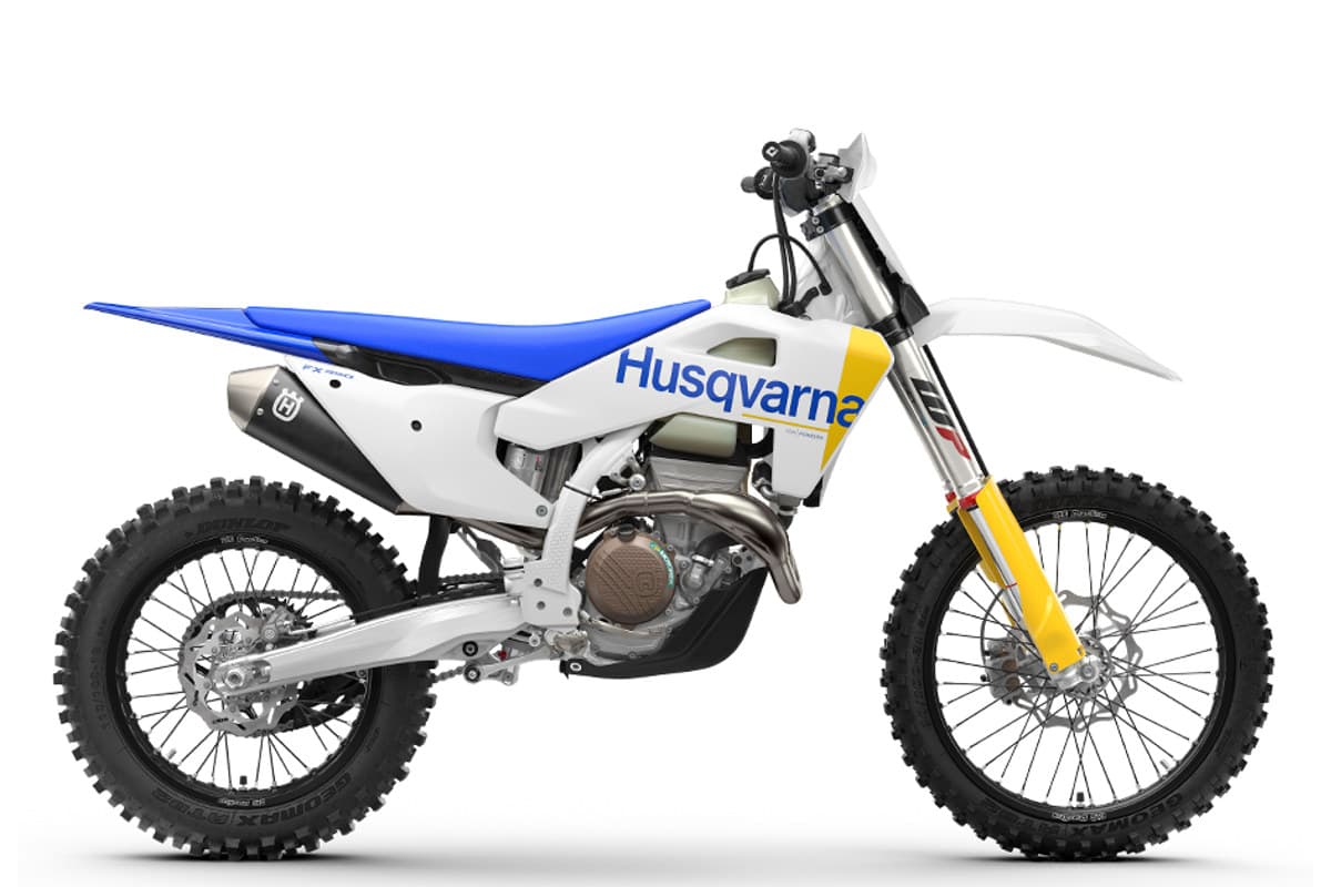 2027 Husqvarna FX 350 cross-country bike in white and blue, right-side studio profile with WP yellow fork and Dunlop knobby tires