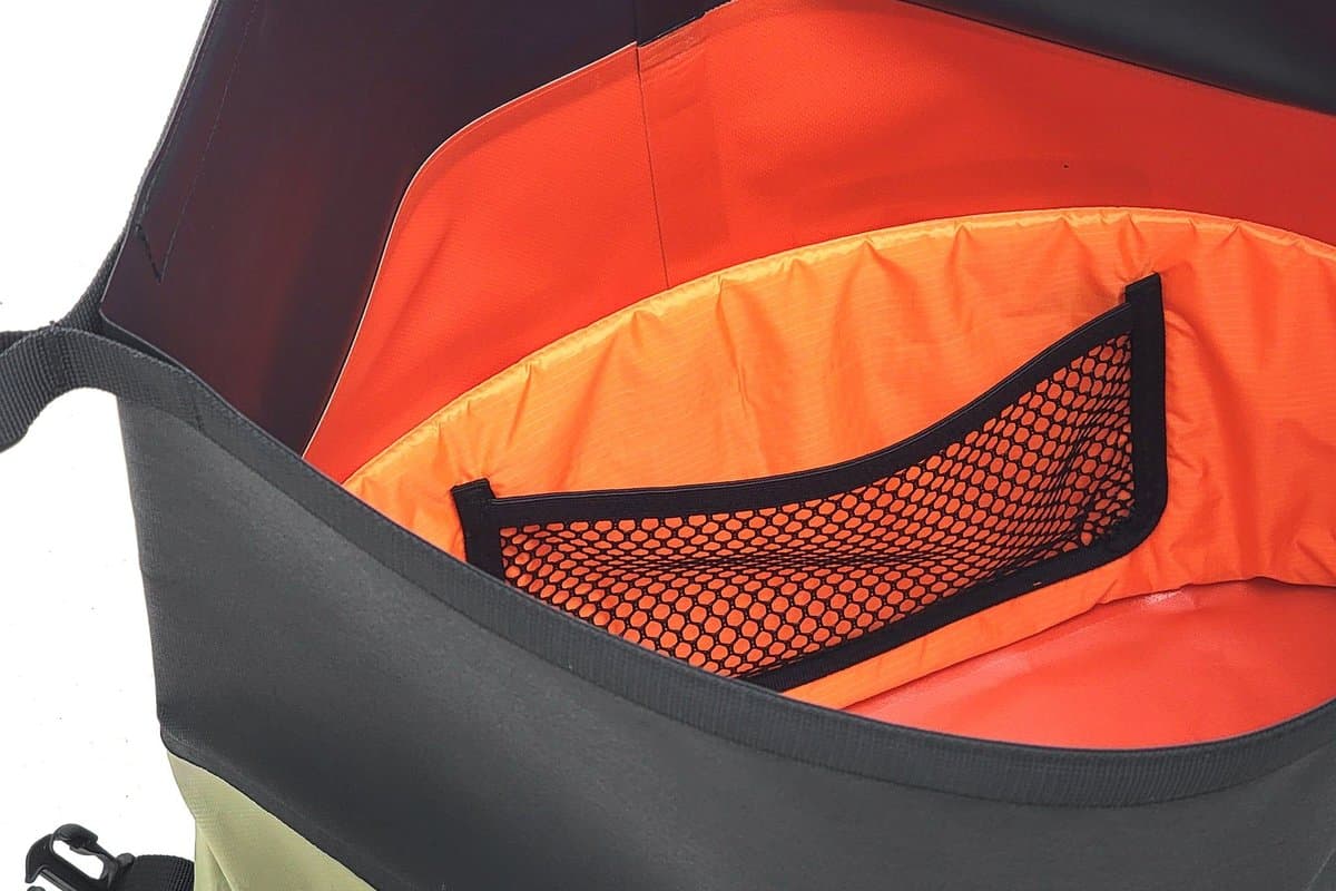 Inside a D20 bag showing the orange lining and mesh pocket