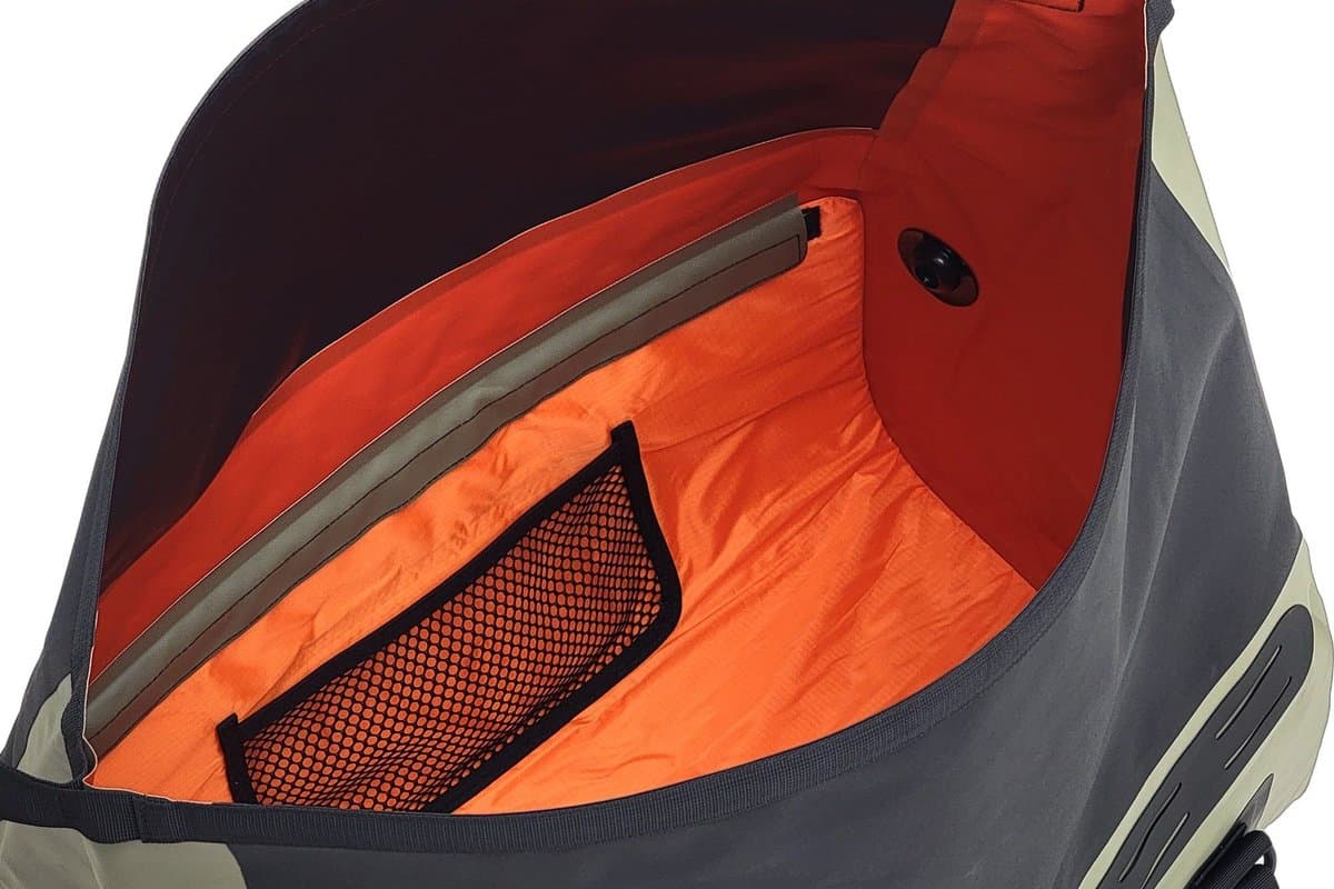 D38 opened, showing the orange lining, mesh pocket and air purge valve