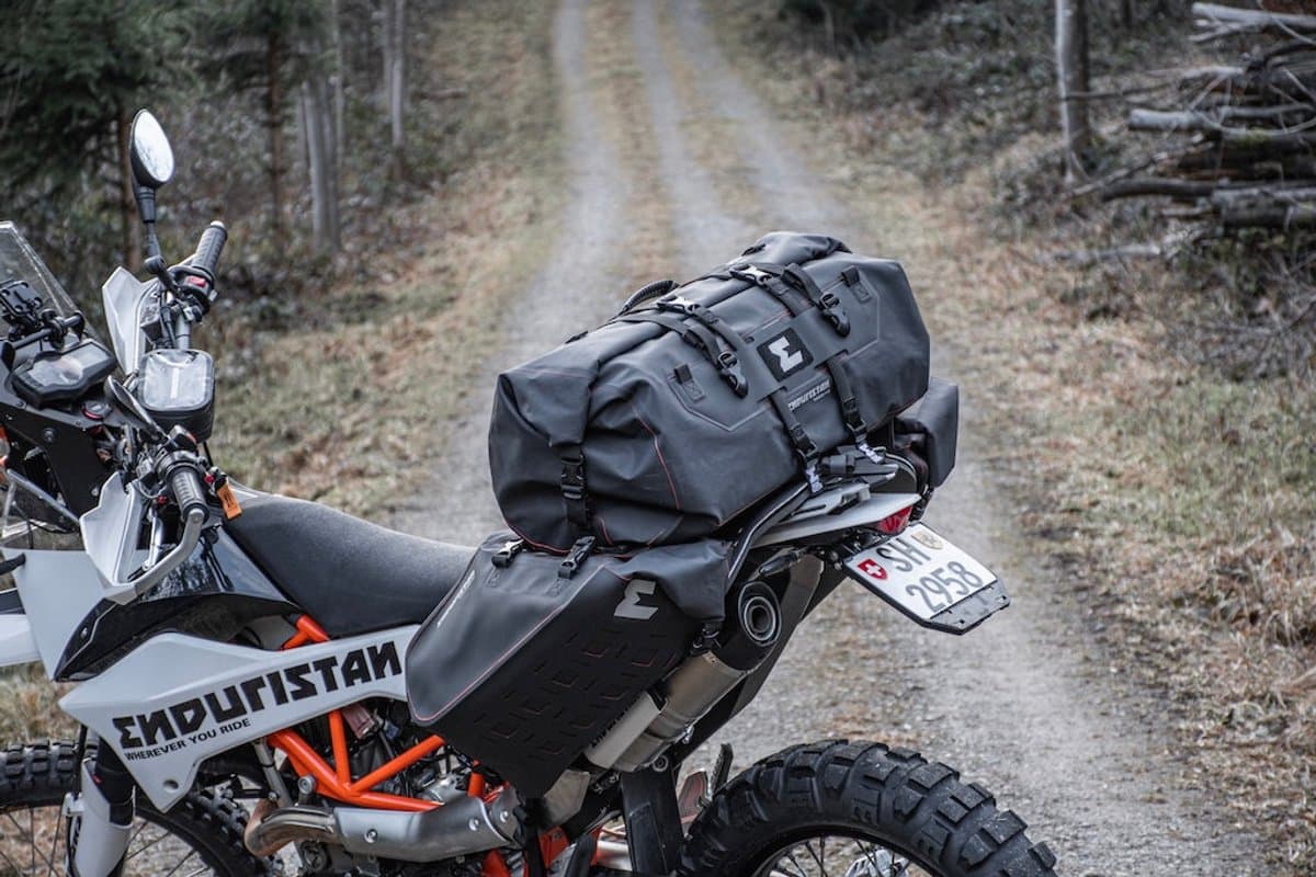Tornado 3 duffel strapped across the tail of a KTM 690 Enduro