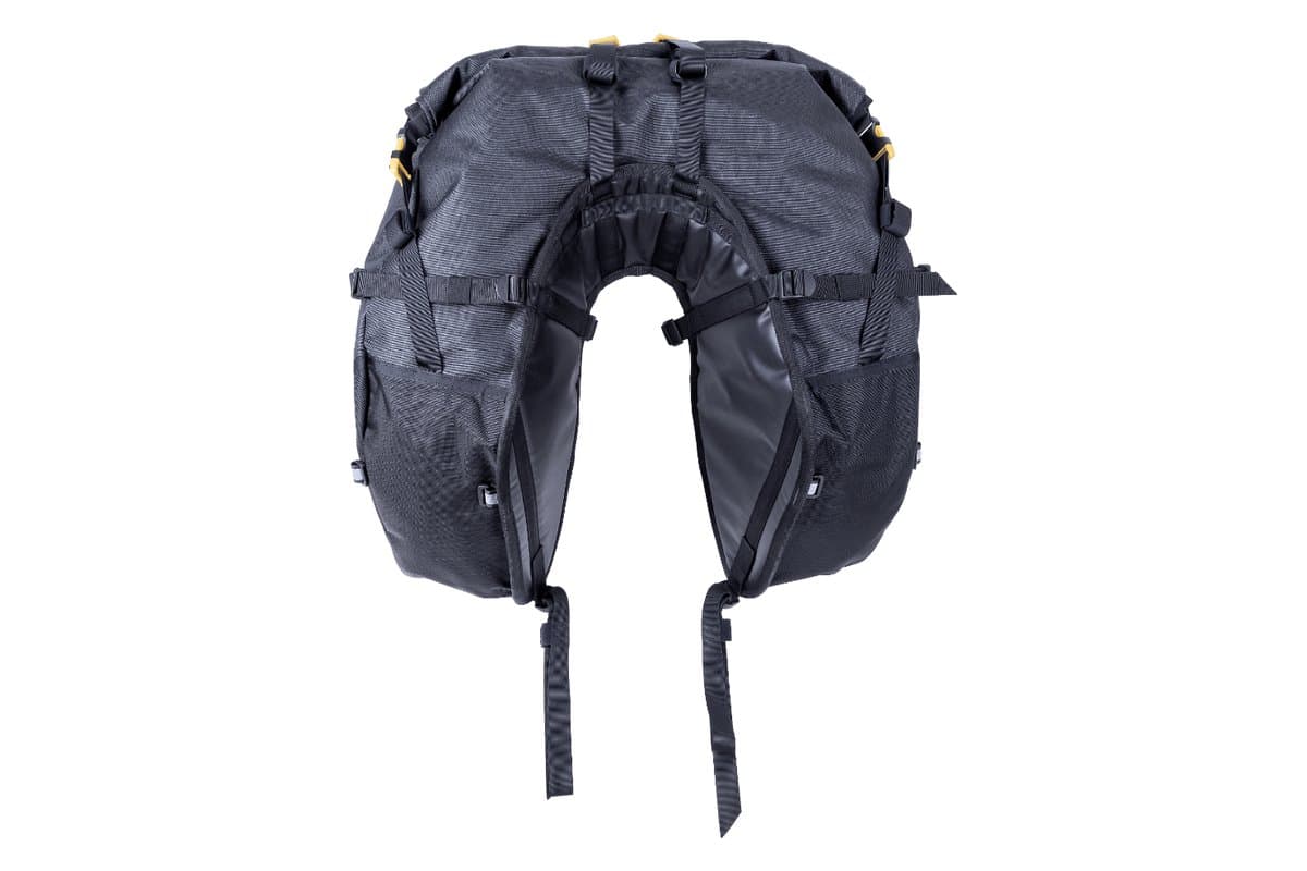 Coyote saddlebag from the front showing the seat-side panel and mounting straps