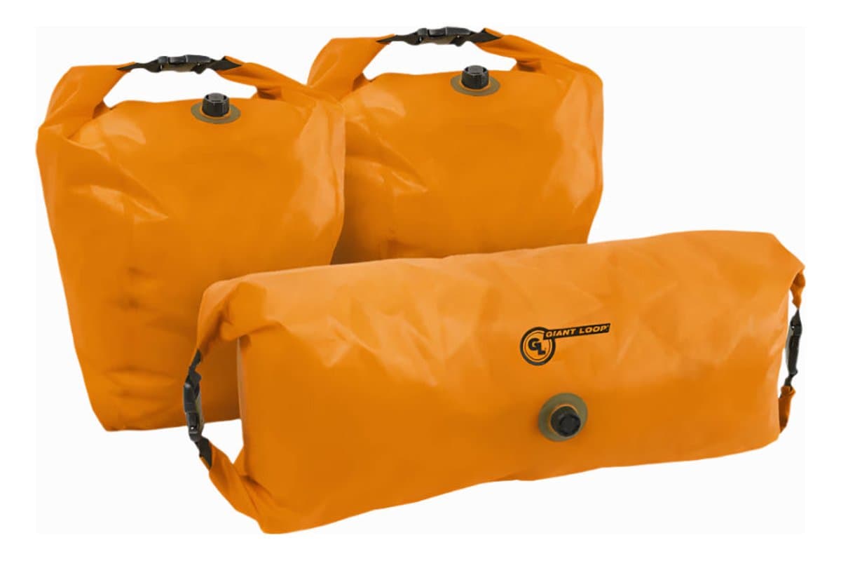 The three orange Saddlebag Dry Pod liners included with the Great Basin