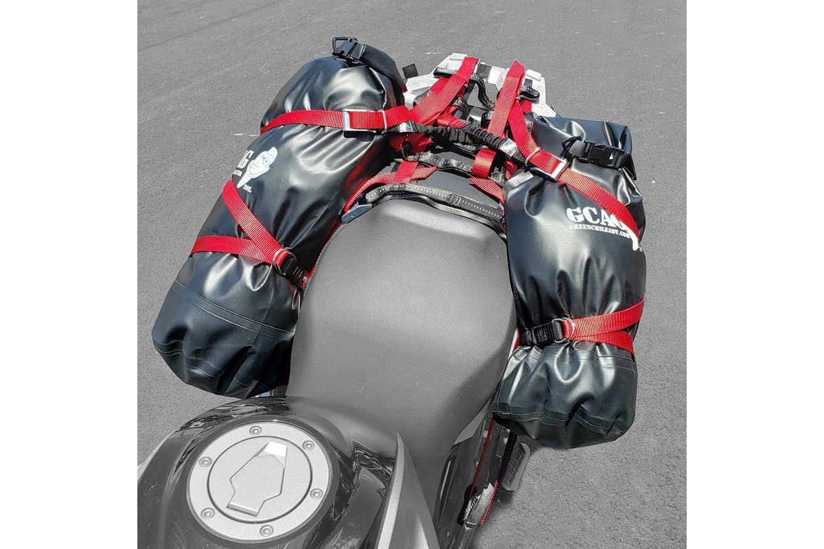 Top view of the soft rack on a BMW G 310 GS with a dry bag strapped down each side of the seat