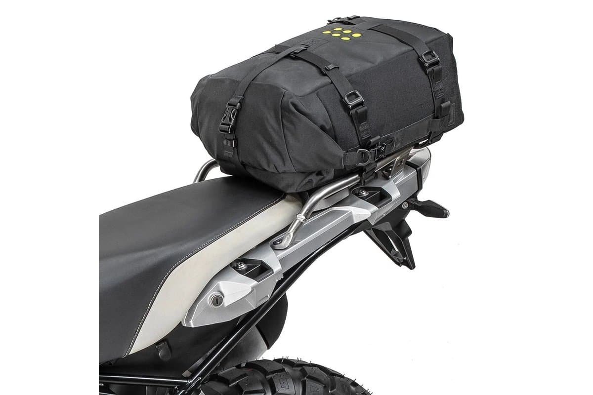 OS-18 mounted crosswise on an adventure bike rear rack