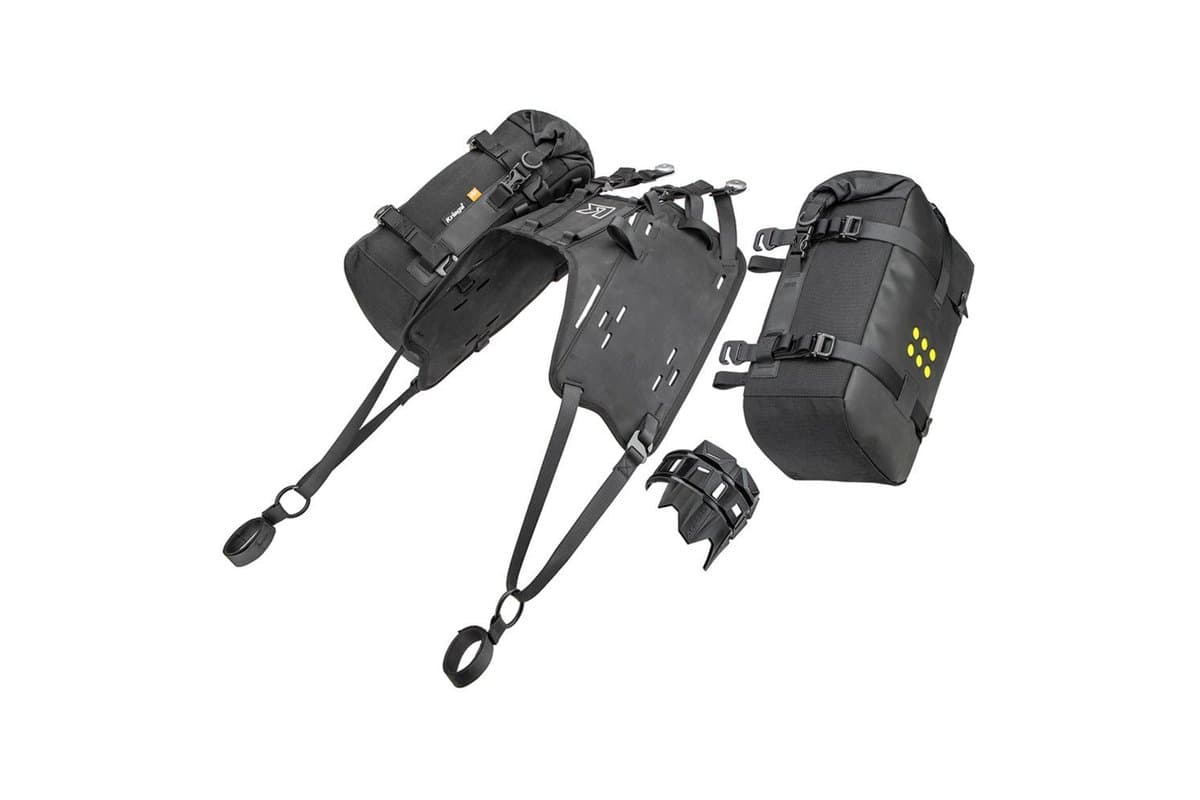 OS-Base Dirtbike harness laid out with its straps, rings, heat shield and one pack