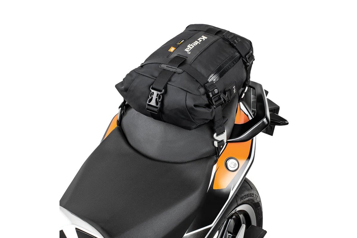 US-5 mounted on a motorcycle pillion seat