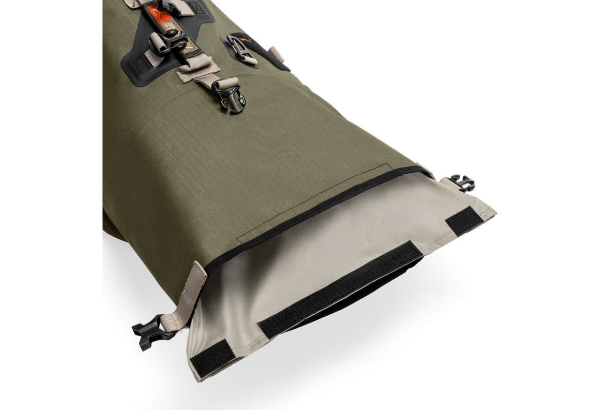 Alpine 60L leg bag with its roll-top unrolled