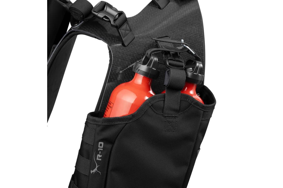 Close-up of fuel bottles stowed in a Reckless 10L leg holster