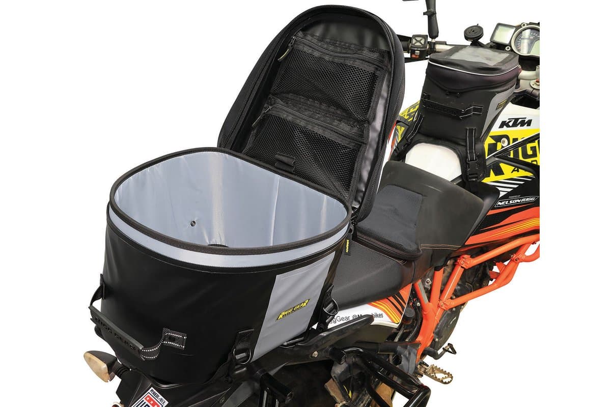 Hurricane Adventure Tail Bag open on the bike, showing the lid pockets