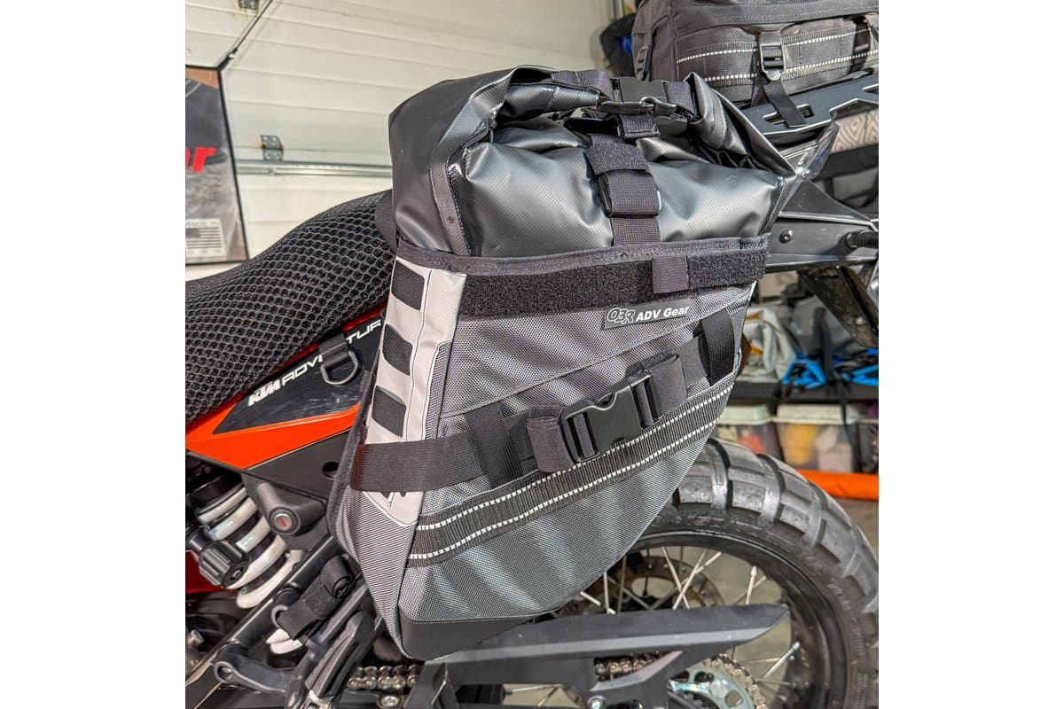 Holster with loaded dry bag mounted on a KTM