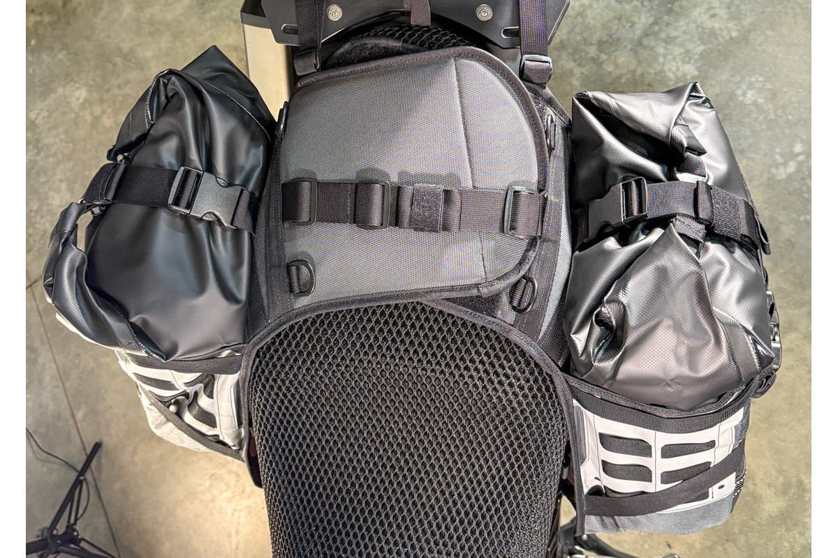 Top view of the system on a motorcycle seat, holsters on both sides
