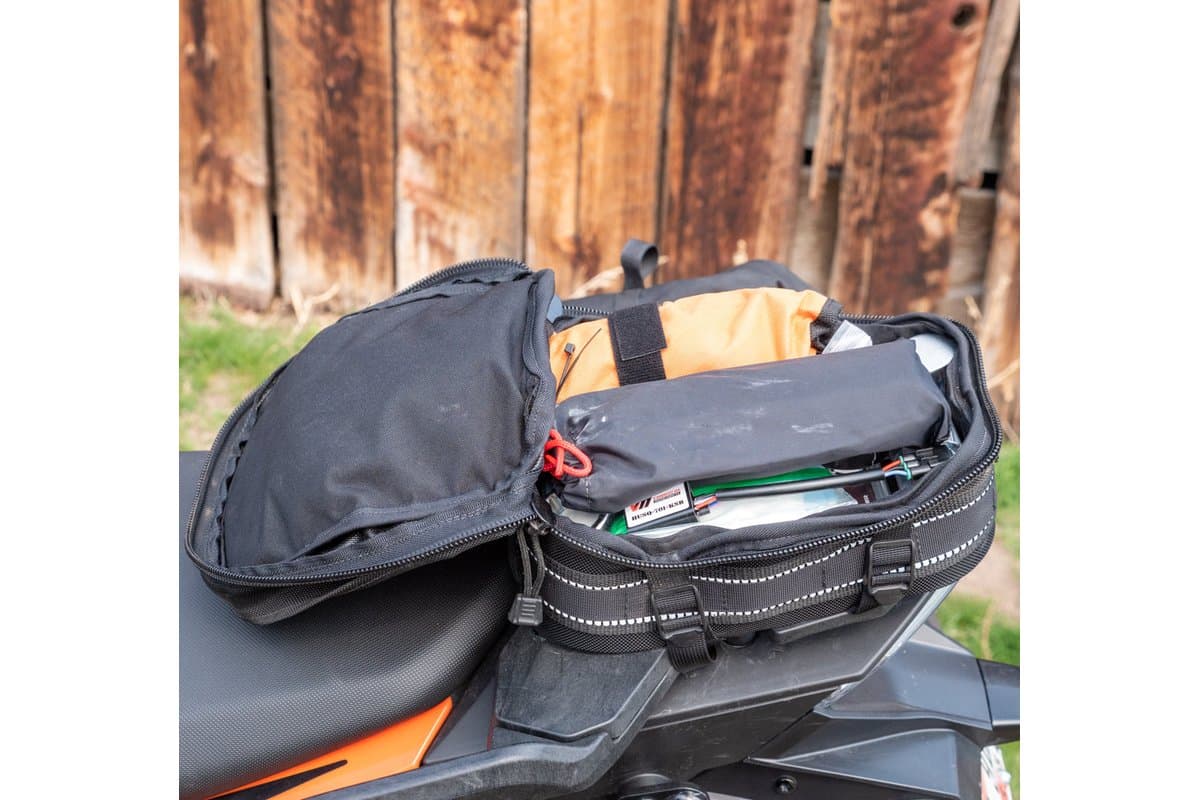 Sherpa opened and packed on the rear of a KTM adventure bike