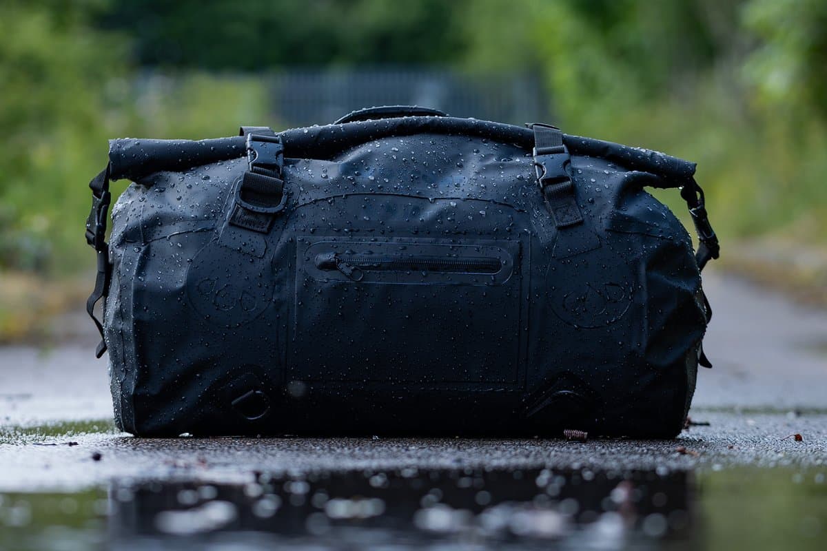 Aqua T-30 sitting on a wet road with water beading on it