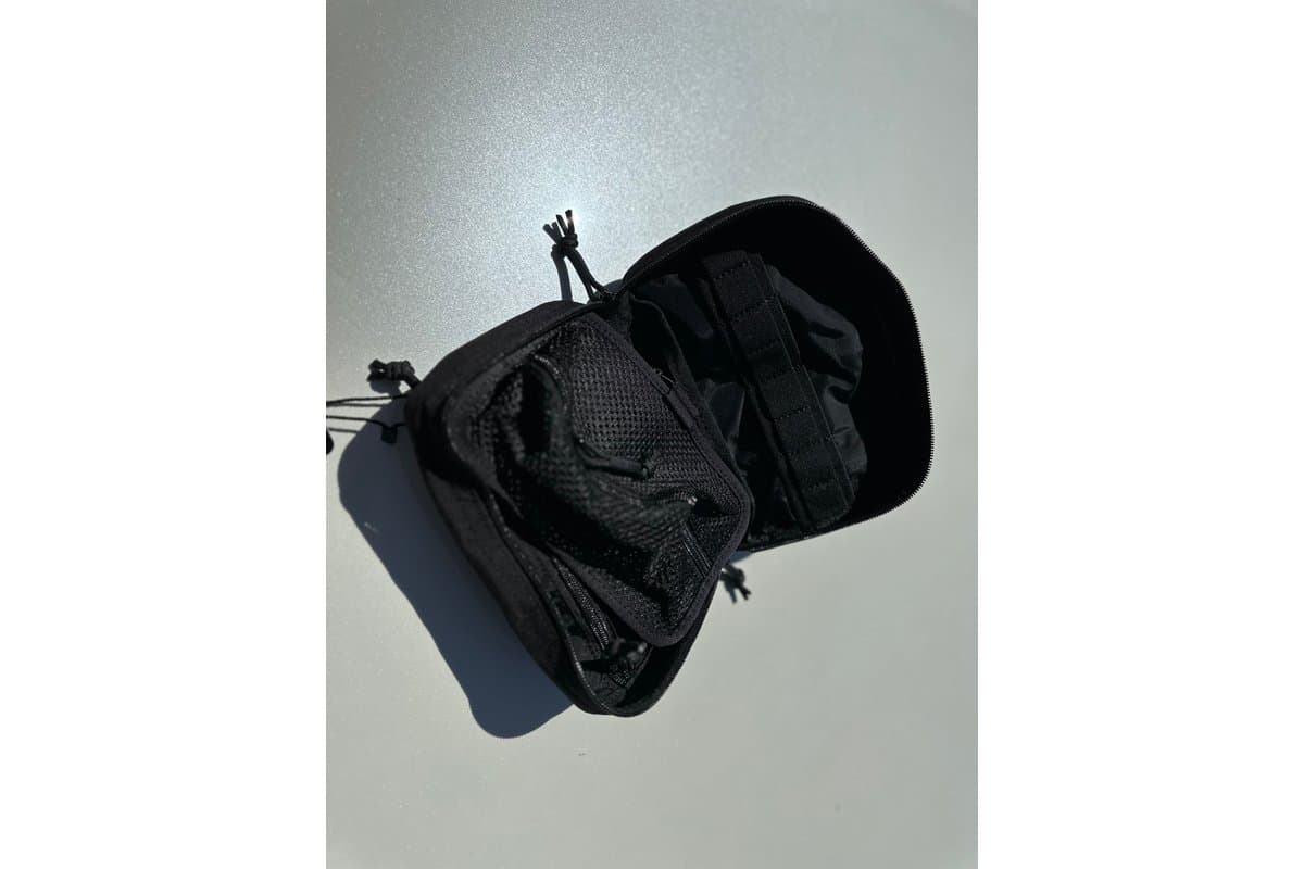 Black Medium Handlebar Bag 2.0 opened to show the interior