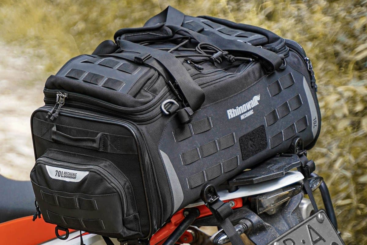 The seat bag strapped to the rack of a KTM adventure bike