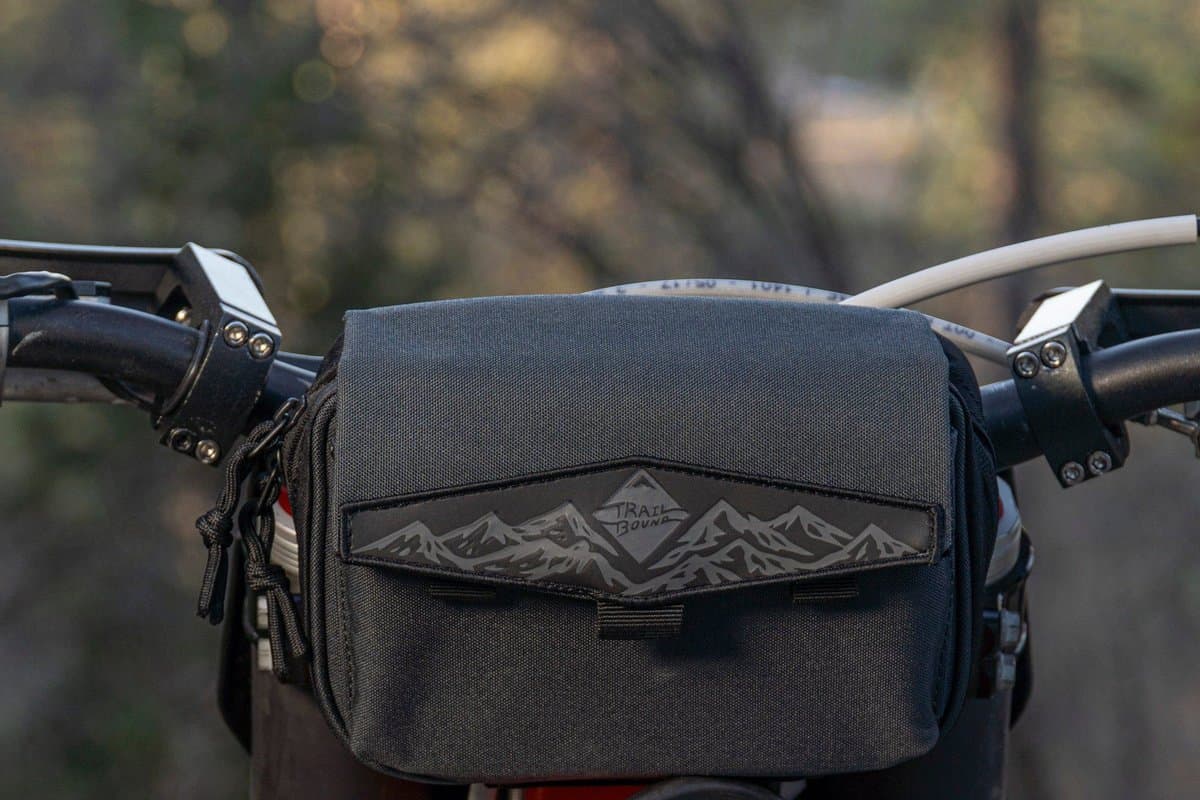 Pad Pack Medium 2 Pocket mounted on a dirt bike handlebar